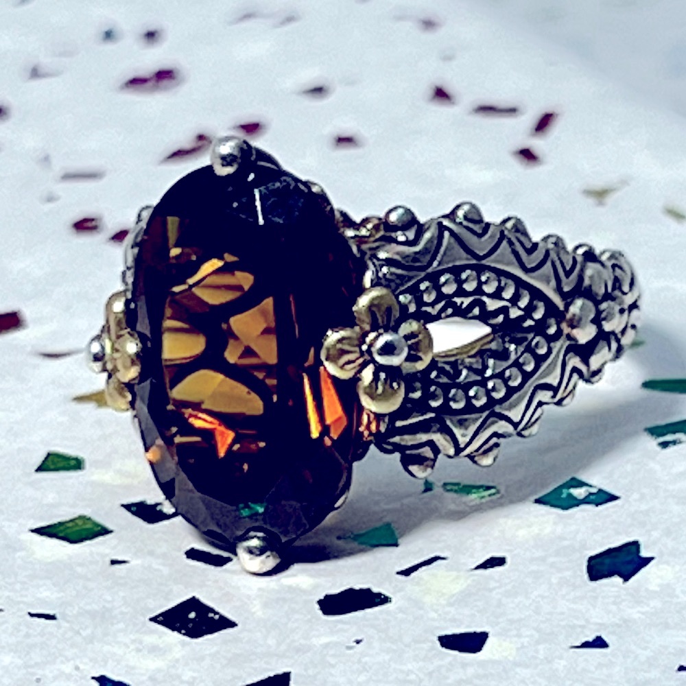 Sterling Silver Floral Filigree Ring with Brown Oval Gem